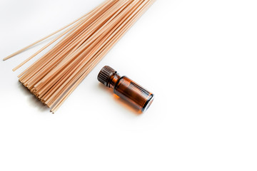 Massage accessories on a white background. Items for Spa treatments. Hand massager and massage oil on a white background.Wooden set for anti-cellulite manual massage.