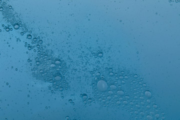 Sample of transparent cosmetic gel as background, closeup