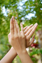 woman hand with beige colour manicure nails