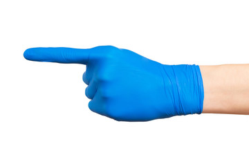 Female hand in blue medical glove isolated on white with finger showing direction gesture. Protection concept