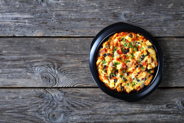Hot chicken tamale pie top view, copy space