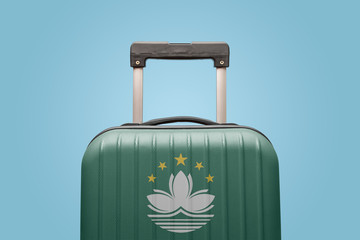 Baggage with Macao flag print tourism and vacation concept.
