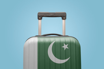 Baggage with Pakistan flag print tourism and vacation concept.