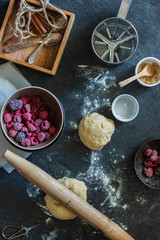 Rustic baking ingredients and kitchen utensils. Homemade pastry, baking. Top view flat lay background. Healthy fresh organic food.