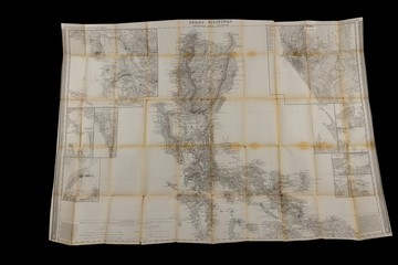 Old map isolated on the black background