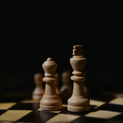 chess pieces on the Board Queen king