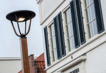 Fototapeta na wymiar Lamp posts at Batavia City. Shopping centre. Lelystad Netherlands. Batavia stad. 