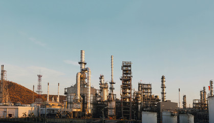 Panorama Oil and gas industrial, Refinery Oil storage tank and pipe line steel on morning sunlight background.