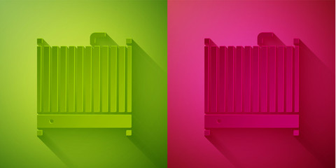 Paper cut Car radiator cooling system icon isolated on green and pink background. Paper art style. Vector Illustration