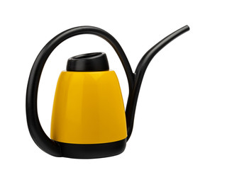 yellow watering can for watering indoor plants