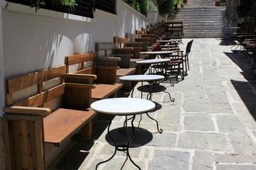 Athens, Greece, May 6 2020 - Empty cafe-restaurant during the Coronavirus lockdown.