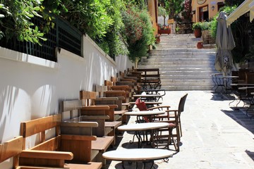Athens, Greece, May 6 2020 - Empty cafe-restaurant during the Coronavirus lockdown.