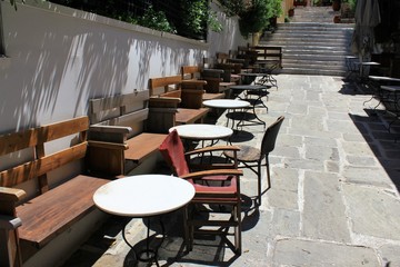 Athens, Greece, May 6 2020 - Empty cafe-restaurant during the Coronavirus lockdown.