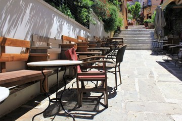 Athens, Greece, May 6 2020 - Empty cafe-restaurant during the Coronavirus lockdown.
