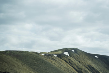 Snow patches on a mountain top 