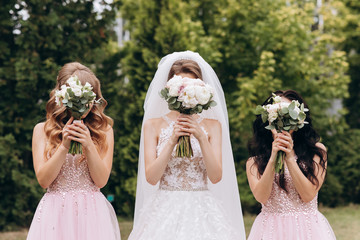 Wedding bouquet of a bride and two bridesmaid.