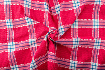 pink delicate checkered thin dish towel in the kitchen