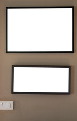 Mock up  black picture frames on  cream wall with light switch template.