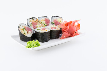 Close-up of traditional Japanese sushi on a white background. Design of the sushi bar menu. Japanese cuisine.