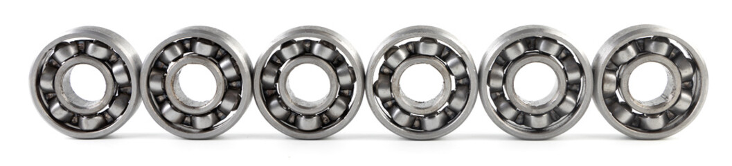 Set of various metal rolling bearing spare part of mechanical on white background.