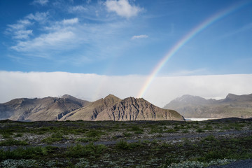 Rainbow over Icelandic glacier