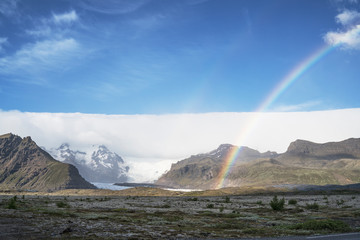 Rainbow over Icelandic glacier