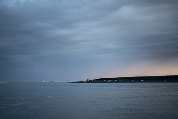People on the beach J&ouml;kuls&aacute;rl&oacute;n glacier lagoon