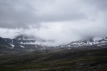 Snowy misty mountains
