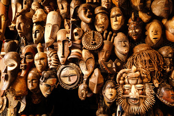 Display of tribal african wooden masks in Marrakech souk in Morroco
