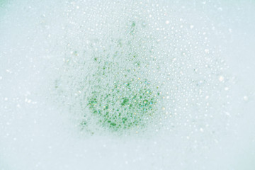 Green lather background, top view.