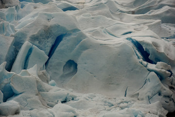 Blue crevasses and seracs on Nigardsbreen glacier in Norway
