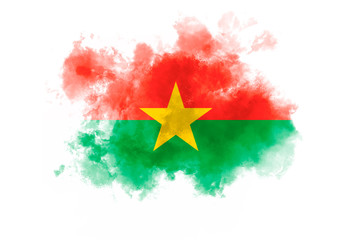 Burkina Faso flag performed from color smoke on the white background. Abstract symbol.