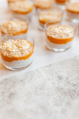 Chia seeds and mango pudding on the table