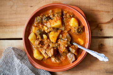 Thick hot soup with potatoes and meat