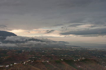 Obraz premium Storm clouds over Nerja, Andalusia, Costa del Sol, Spain