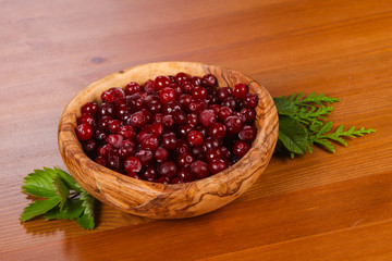 Cranberry in the wooden bowl