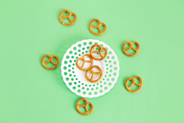 edible dried snack bagels in a white decorative plate