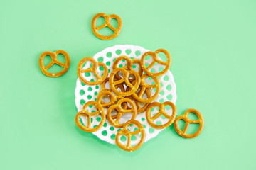 edible dried snack bagels in a white decorative plate