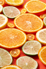 Selection of citrus slices on paper background 1