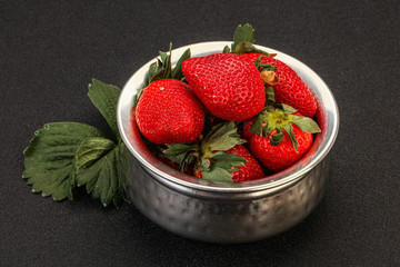 Ripe sweet strawberry with leaf
