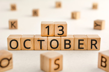 October 13 - from wooden blocks with letters, important date concept, white background random...