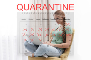 Young woman using laptop at home and calendar. Quarantine during coronavirus outbreak