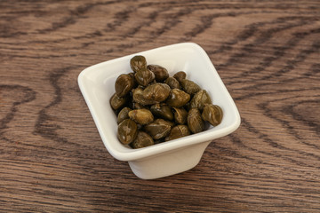 Tasty capers in the bowl