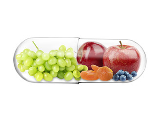 Transparent capsule with different fruits and berries rich in vitamins on white background