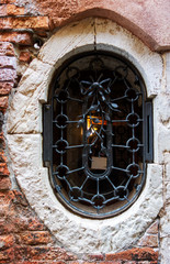 Window with decorative security bars