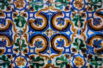 Traditional tiled wall decoration in a city palace in Seville, Spain