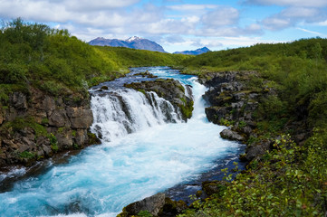 Fototapeta na wymiar South Iceland Bruarfoss Waterfall with turquoise water flowing