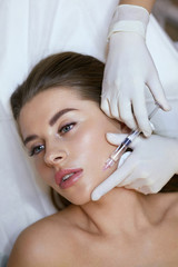 Obraz na płótnie Canvas Face Injection. Rejuvenation Procedure For Facial Lifting. Anti Aging Skincare In Cosmetic Salon.