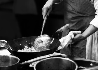 chef cooking in a kitchen, chef at work, Black & White