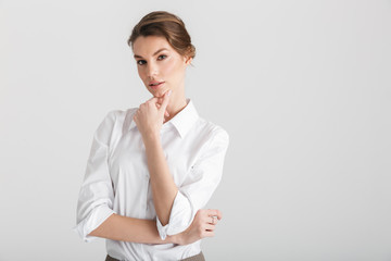 Image of young seductive woman posing and looking at camera